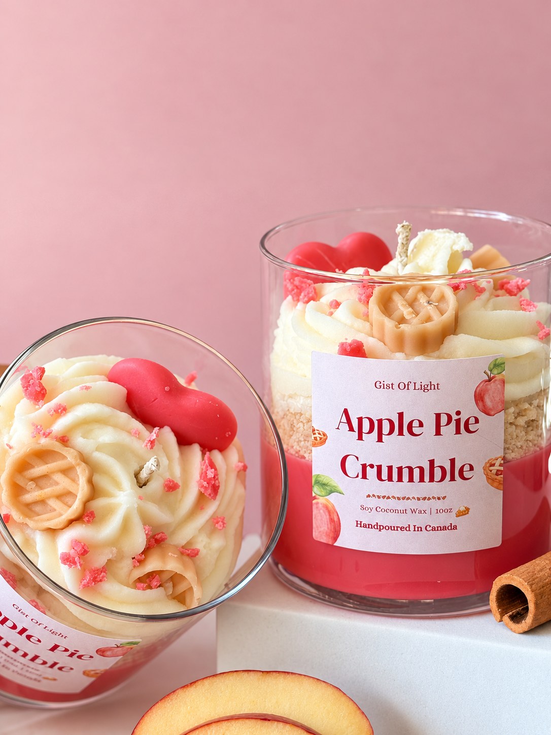 Apple Pie Crumble candle tipped to show the whipped wax top, wax lattice pie, red wax heart and pink crumble