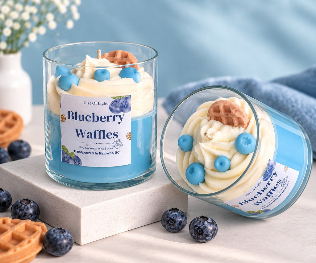 Two Blueberry Waffles candles, one on its side to show the whipped wax top and cotton wick
