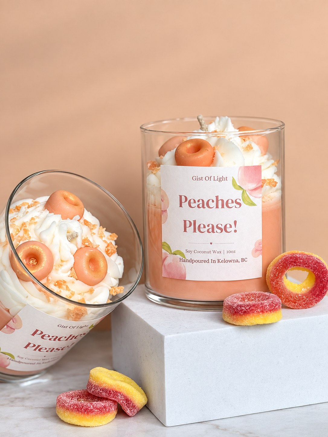 Peaches Please! candle tipped to show the whipped wax top, wax peach rings and golden crumble