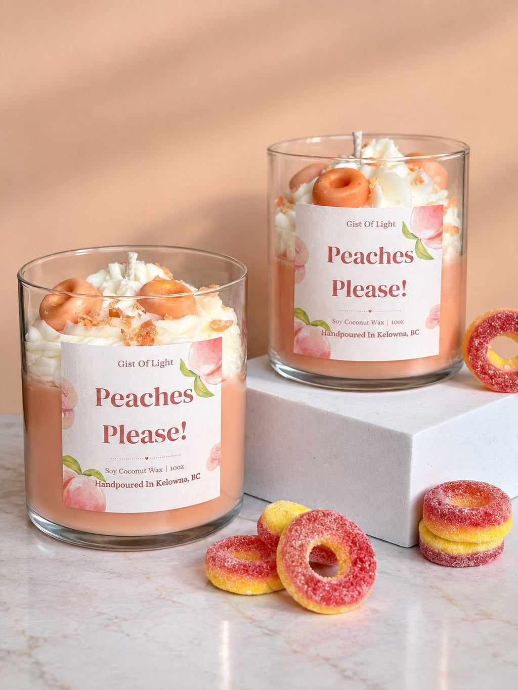 Two Peaches Please! peach candy scented candles on marble with sugared peach ring sweets