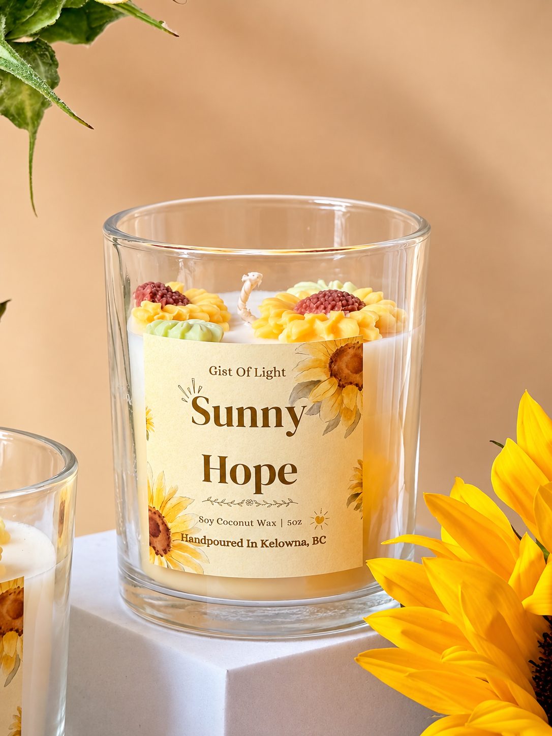 Sunny Hope coconut soy candle with moulded wax sunflowers on top