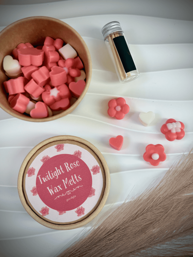 Twilight Rose scented wax melts in pink and white heart and flower shapes.